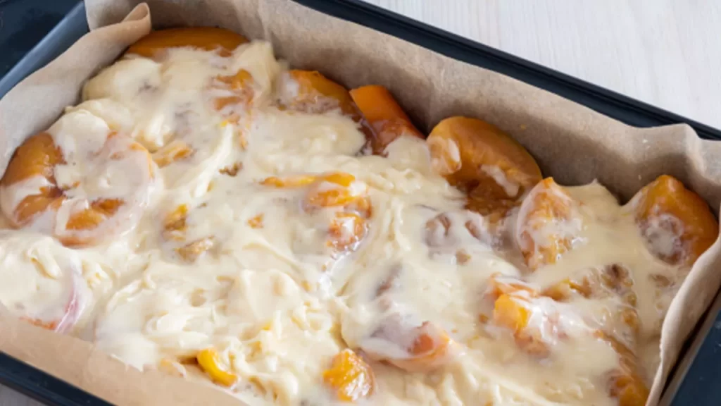 Peach pudding with dough